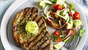 Chargrilled steak with Tabasco butter and avocado salad